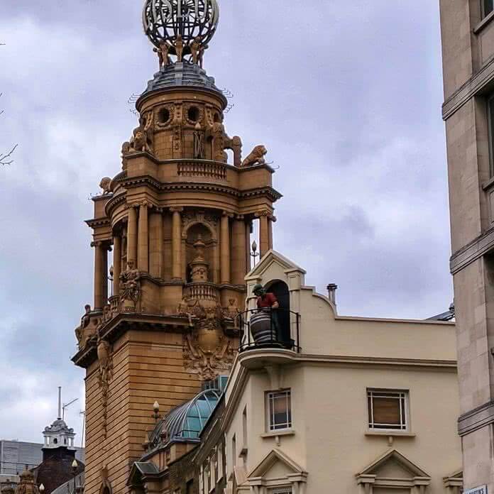 Harry Potter's Burke of Borgin & Burkes, manages a barrel on a rooftop